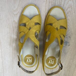 FLY London European size 36 yellow suede sandals with 2” heal.